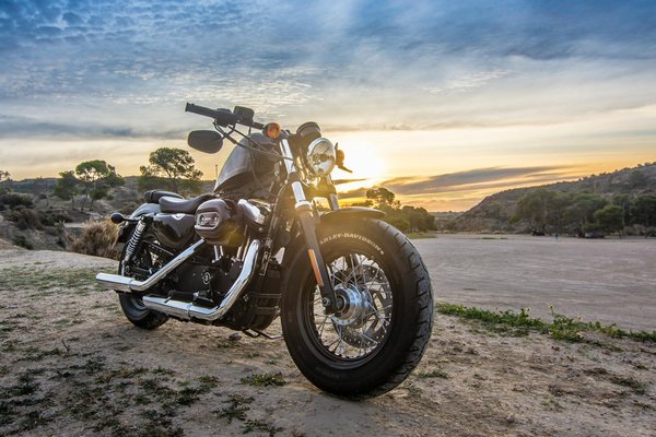 What are the signs that your motorcycle's brakes need immediate attention?